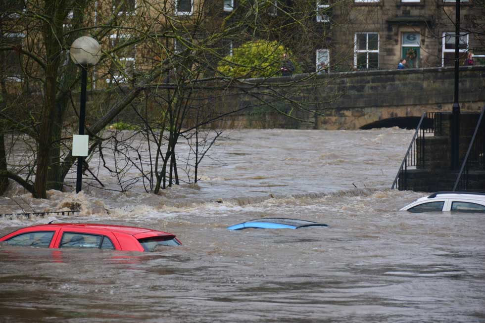 flooded river sunk cars