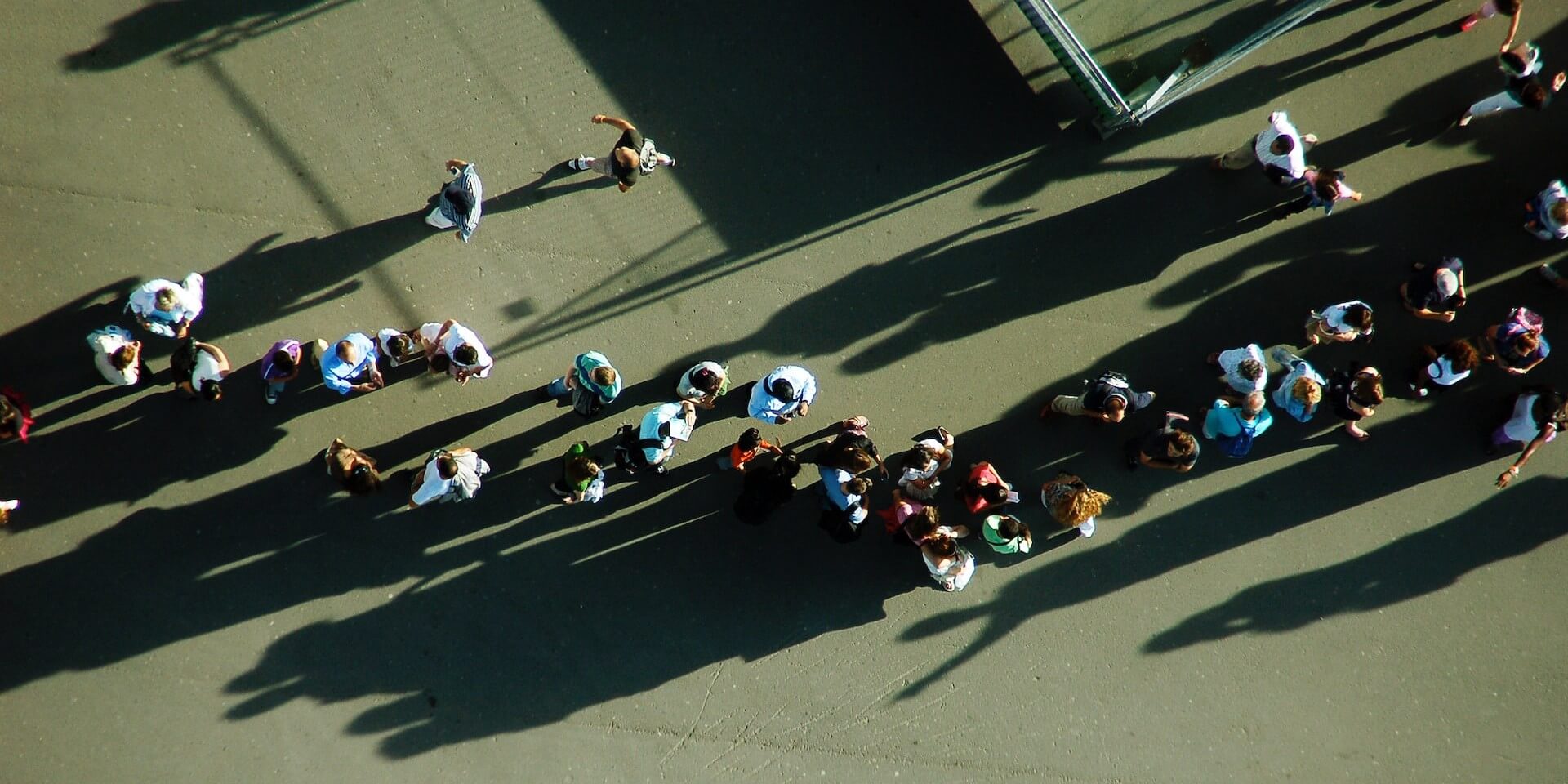 people lining up to head to an assembly area
