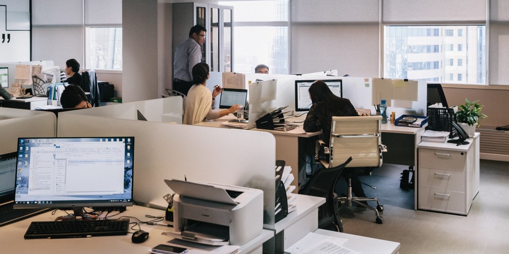 group of people working in an office